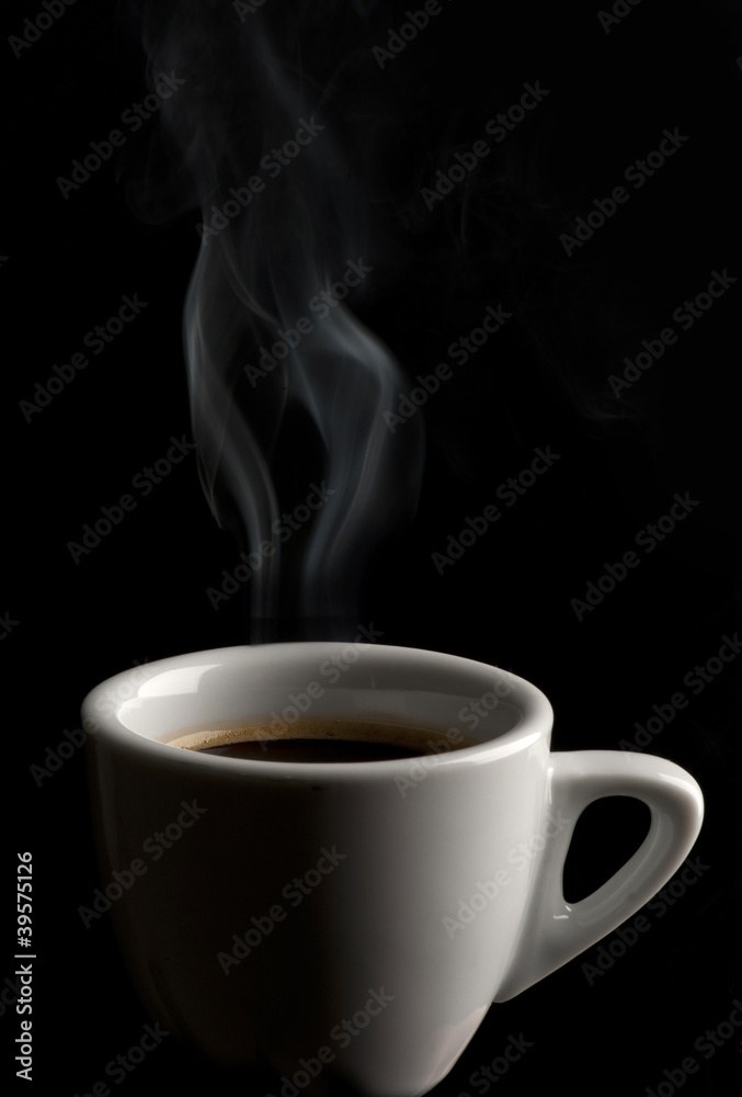 cup of coffee on black background cup of coffee on black background