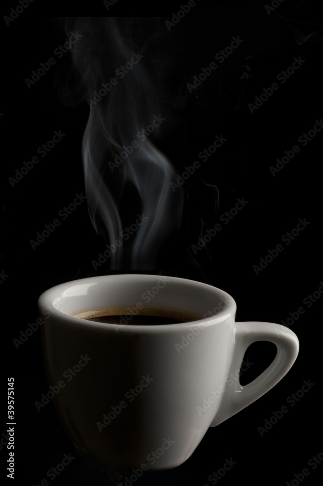 cup of coffee on black background cup of coffee on black background