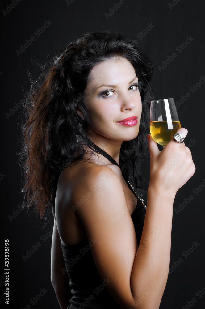 Beautiful girl with wine glass on black Beautiful girl with wine glass on black