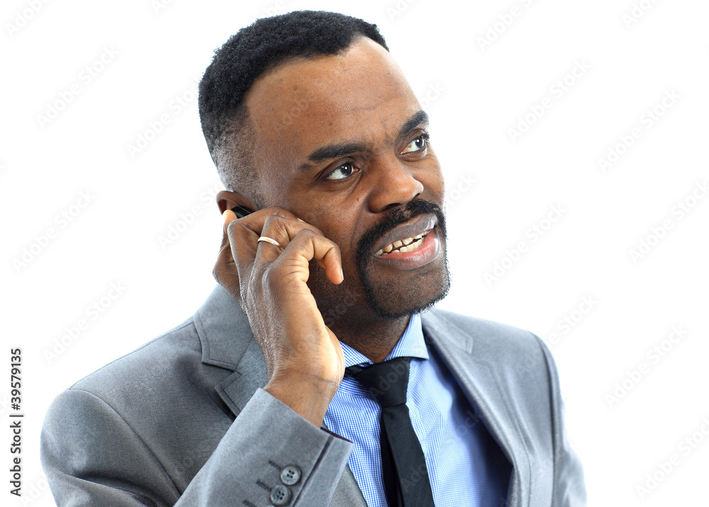 Portrait of a businessman talking on the phone Portrait of a businessman talking on the phone