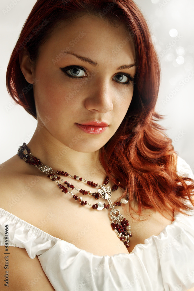 woman in the garnet necklace