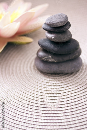 pile of stone and lotus flower  zen  balance and meditation