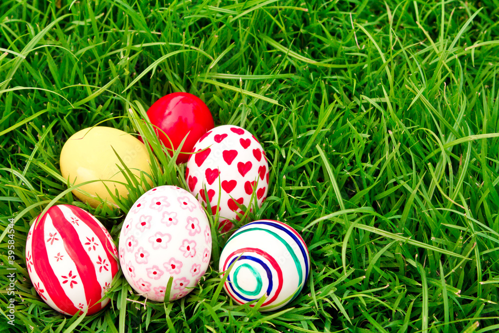 Fototapeta premium Easter Eggs on Fresh Green Grass