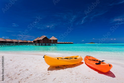 Colourful kayaks on the tropical beach