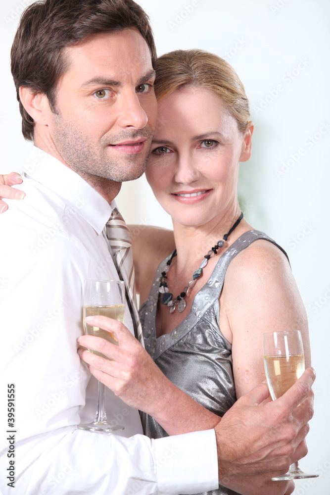 portrait of a couple with champagne portrait of a couple with champagne