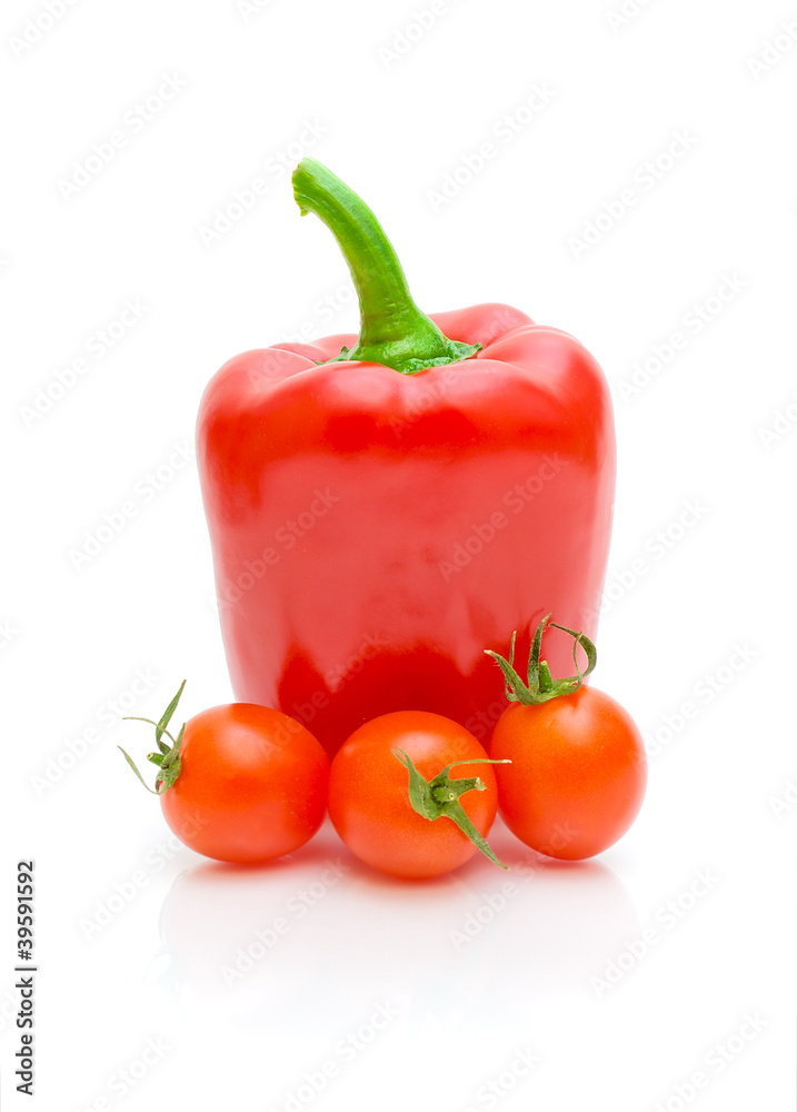 red peppers and tomatoes on a white background red peppers and tomatoes on a white background