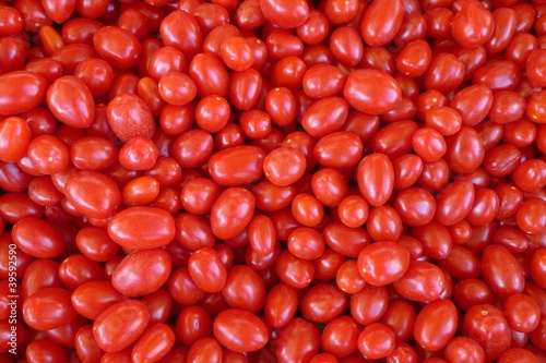 Ablong tomatoes Solanum lycopersicum texture in market basket