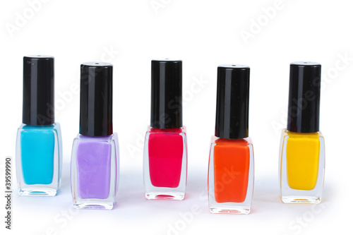 Group of bright nail polishes isolated on white
