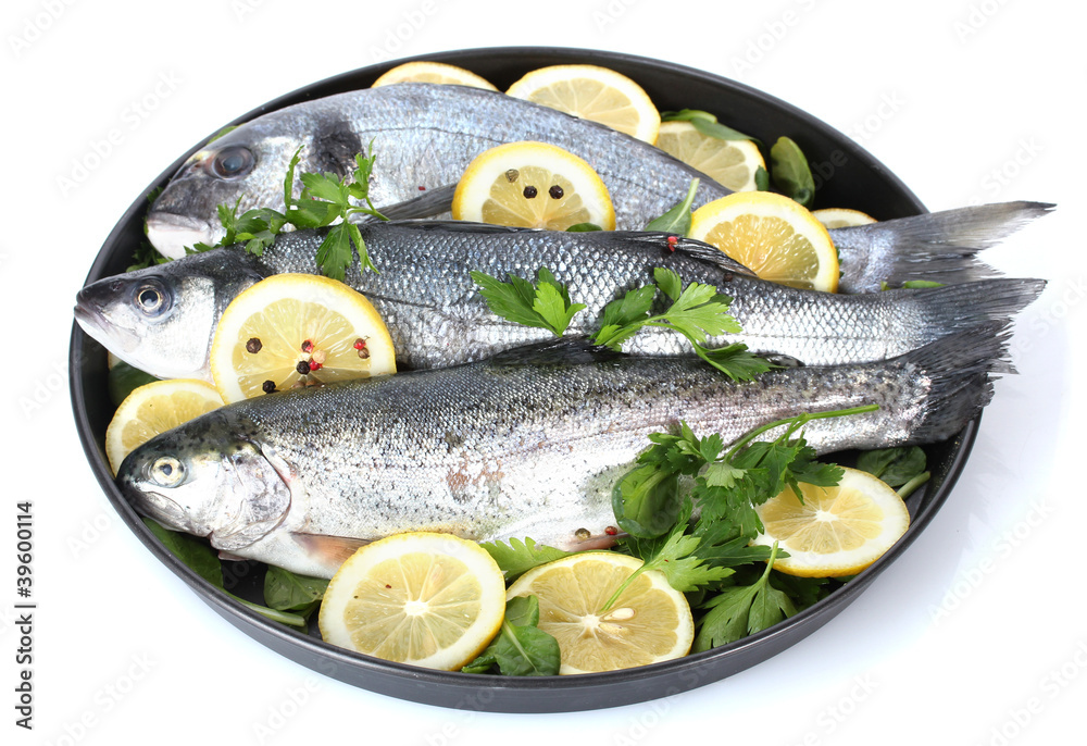 Fresh fishes with lemon, parsley and pepper Fresh fishes with lemon, parsley and pepper