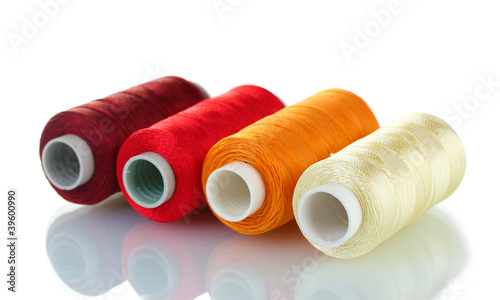 Bilde på lerret bright bobbin thread isolated on white.