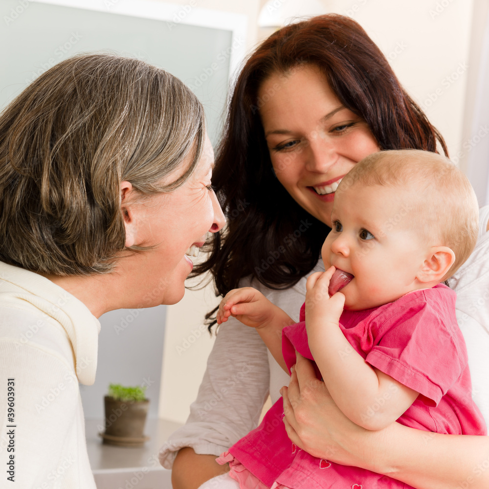Happy family women - grandmother, mum and baby Happy family women - grandmother, mum and baby