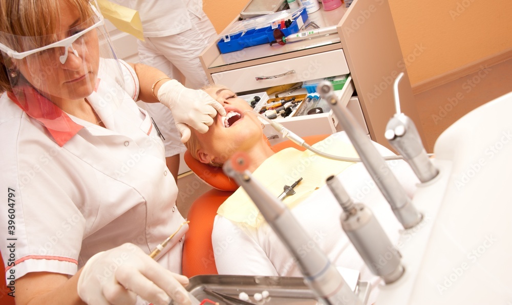 Woman at the dentist's surgery. Woman at the dentist's surgery.