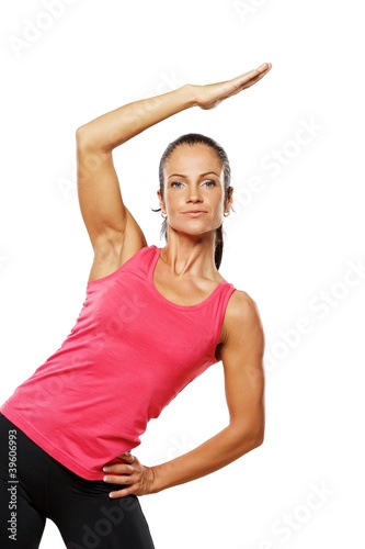 Beautiful athlete woman doing fitness exercise. © Nejron Photo