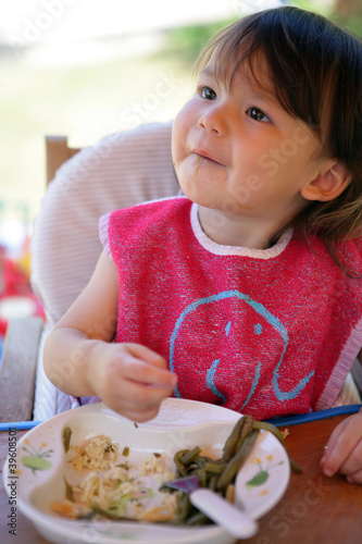 Young child eating a meal