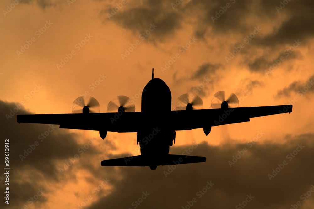 Ταπετσαρία Lockheed C-130 Hercules turboprop cargo aircraft at sunset