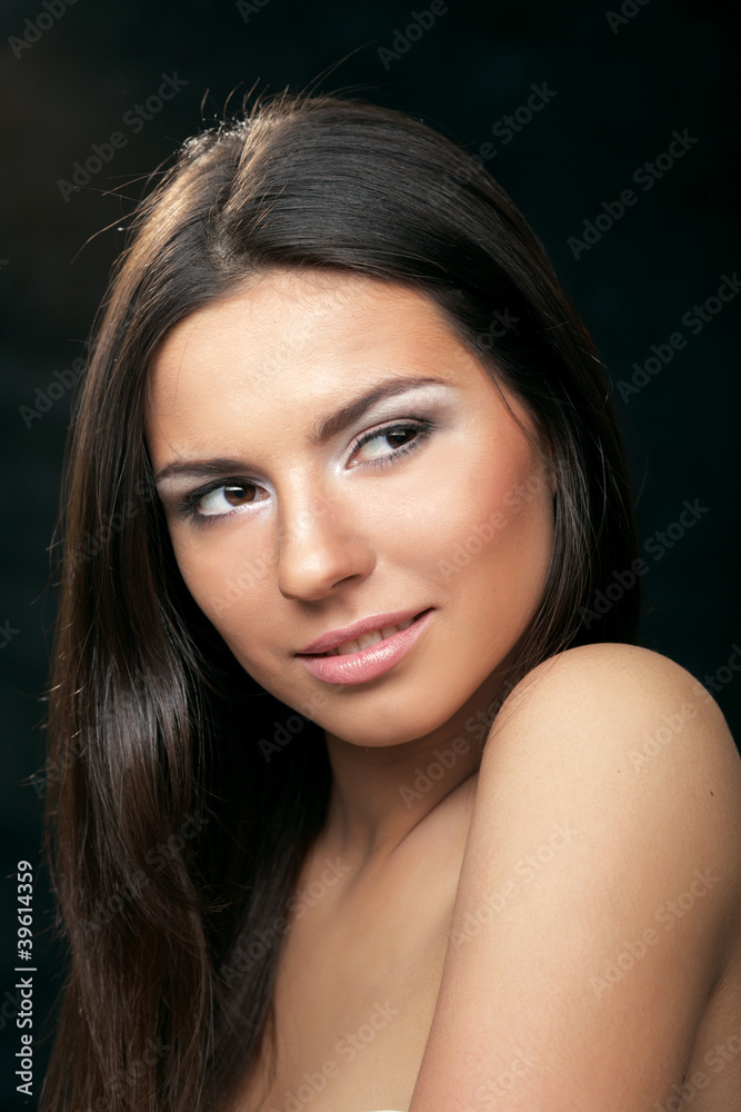 Portrait of a young woman , isolated on black background Portrait of a young woman , isolated on black background