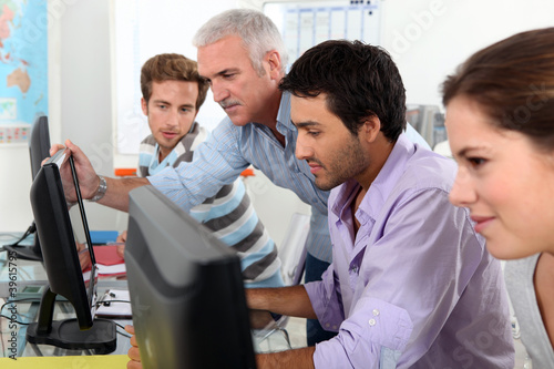 Students using computers in the classroom