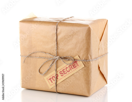 Parcel with top secret stamp isolated on white photo