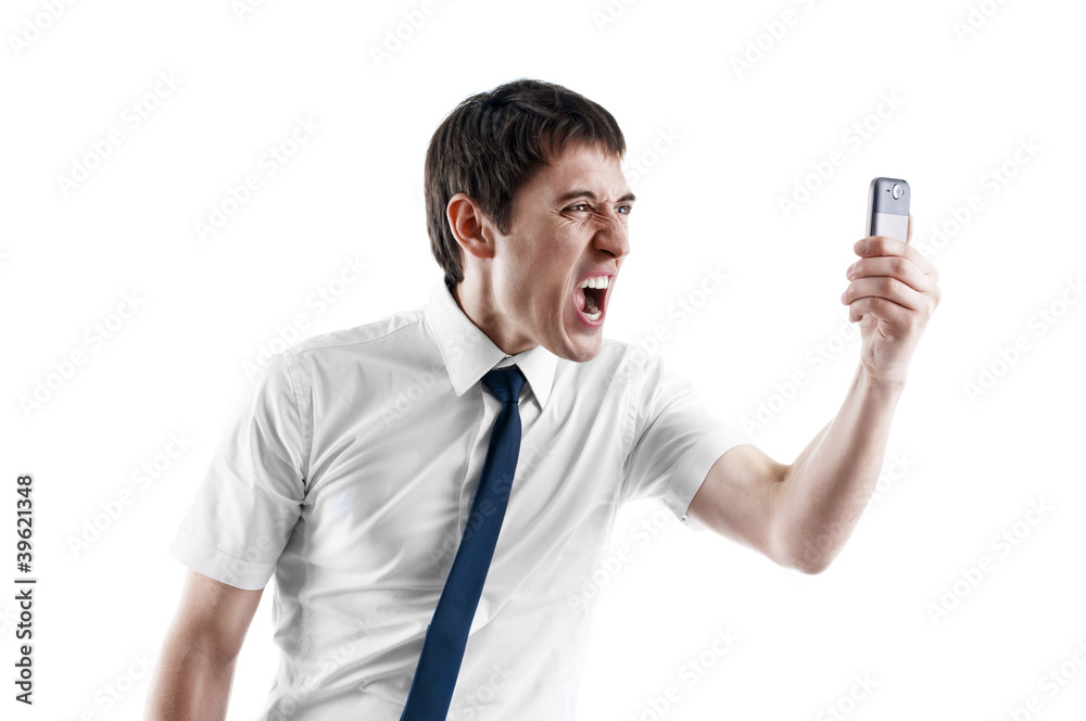 young business man screaming in his cellphone over white