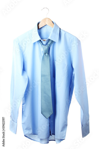 Blue shirt and tie on wooden hanger isolated on white