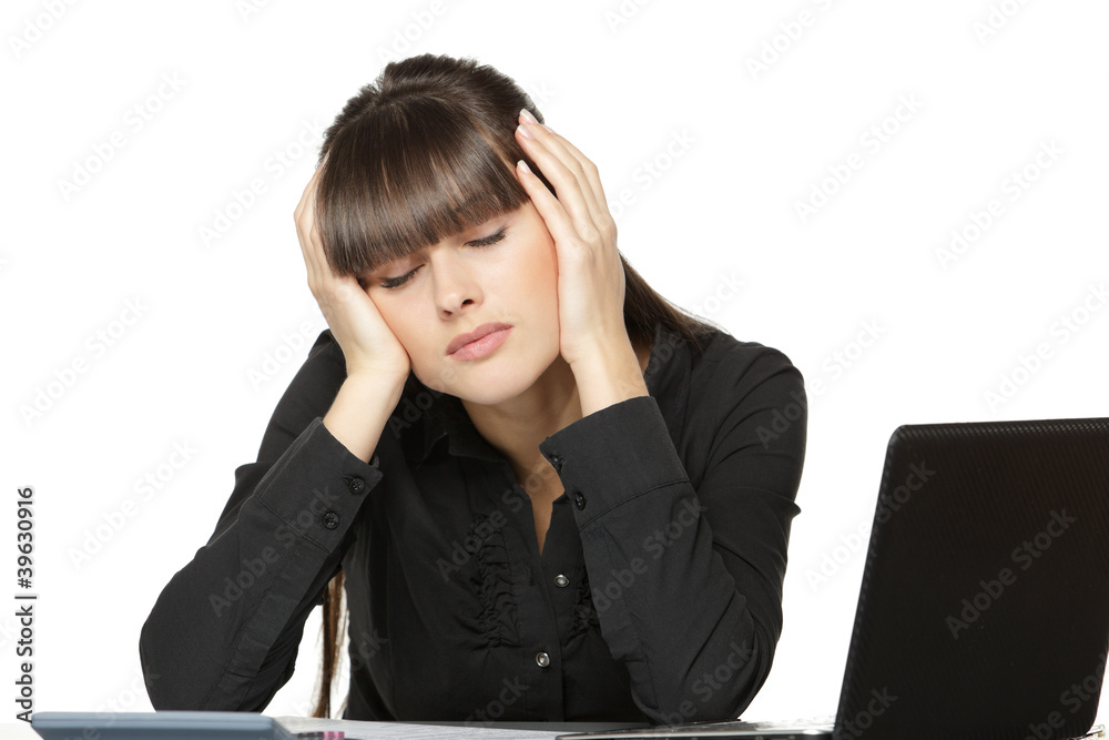 Exhausted woman at the work desk with closed eyes Exhausted woman at the work desk with closed eyes