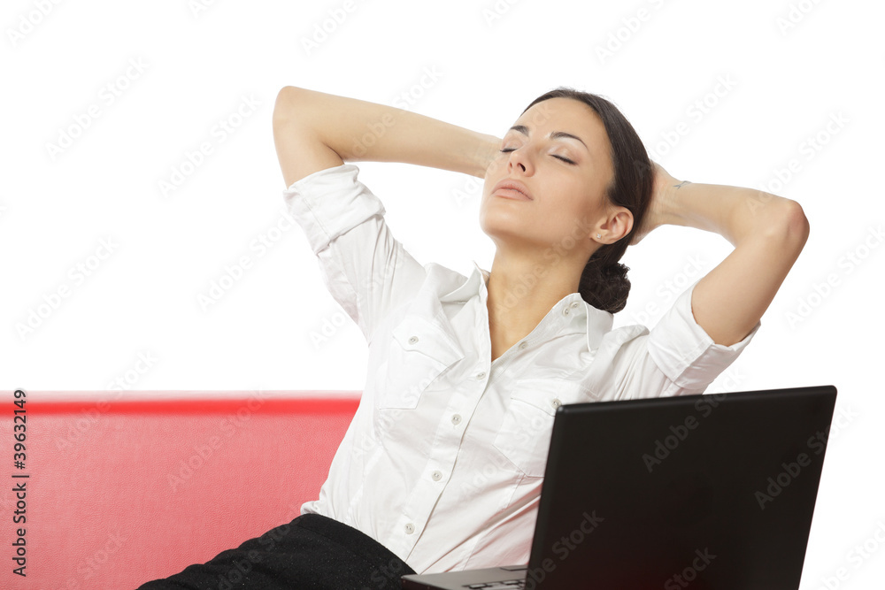 Business woman relaxing with hands behind head Business woman relaxing with hands behind head