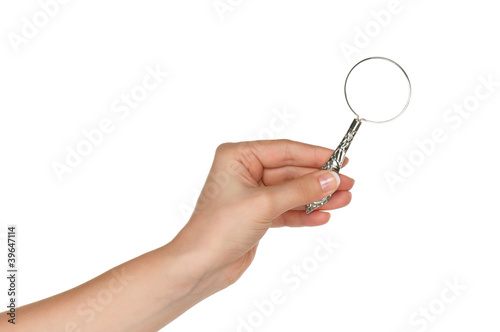 Hand with magnifying glass