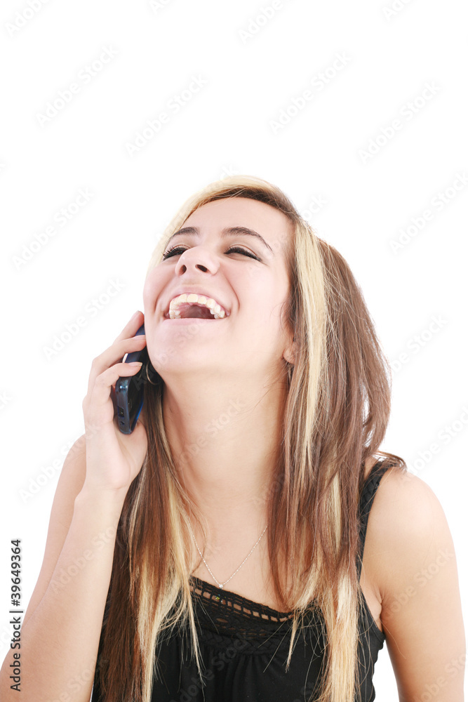 Young beautiful woman bursting out laughing on cellphone. Young beautiful woman bursting out laughing on cellphone.