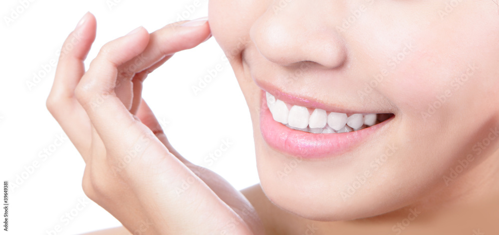 Fototapeta premium Close up a smiling mouth of the girl