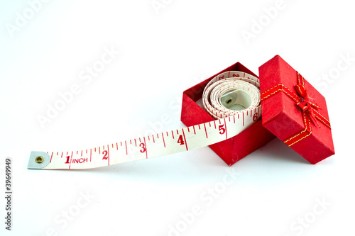 tape measure in a red gift box