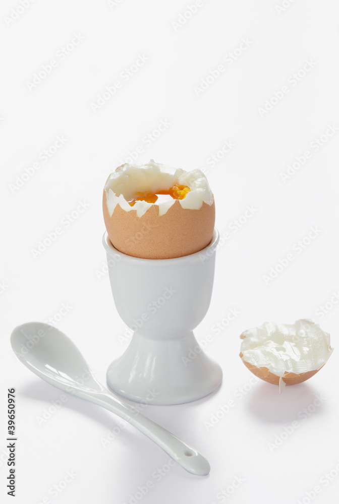 A boiled egg in cup with spoon, Isolated with Clipping Path A boiled egg in cup with spoon, Isolated with Clipping Path