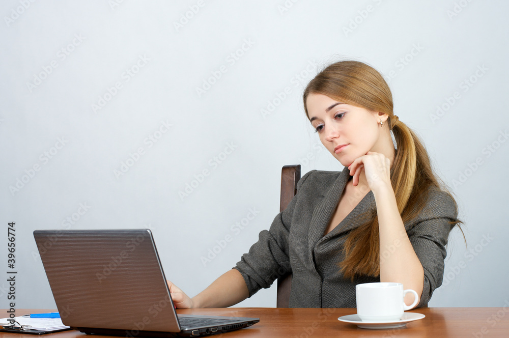 Businesswoman working on laptop Businesswoman working on laptop