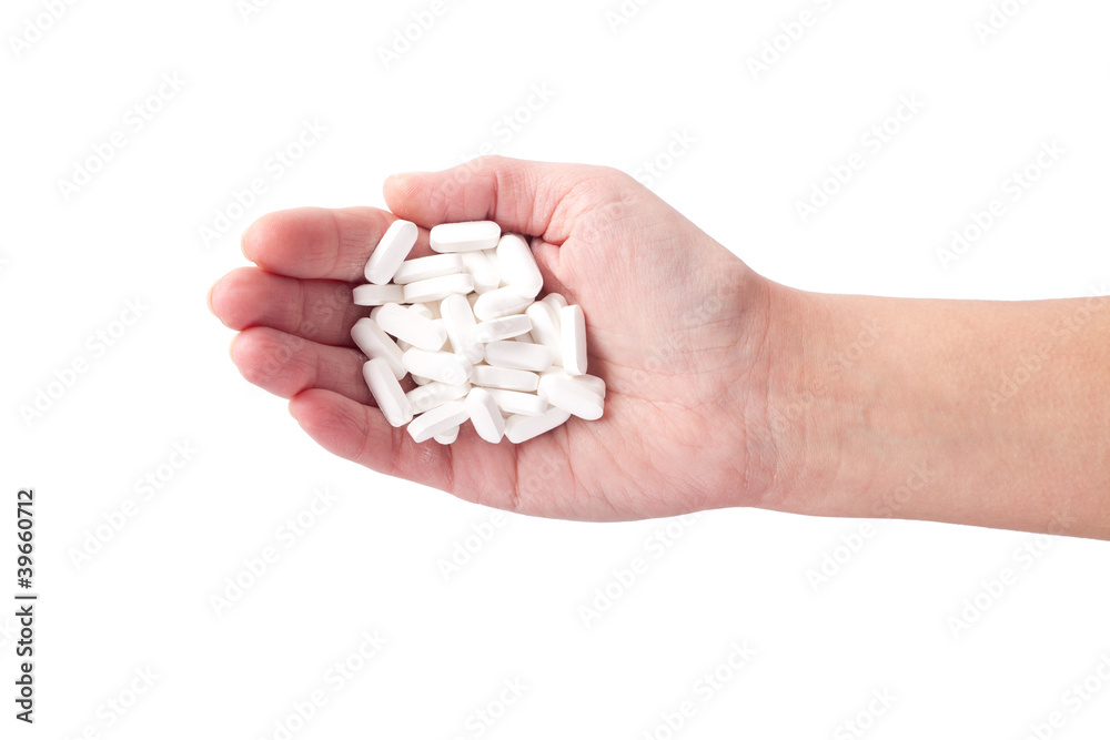 white pills in hand white pills in hand