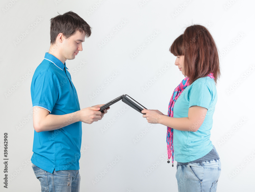 A young couple with a Tablet PC A young couple with a Tablet PC