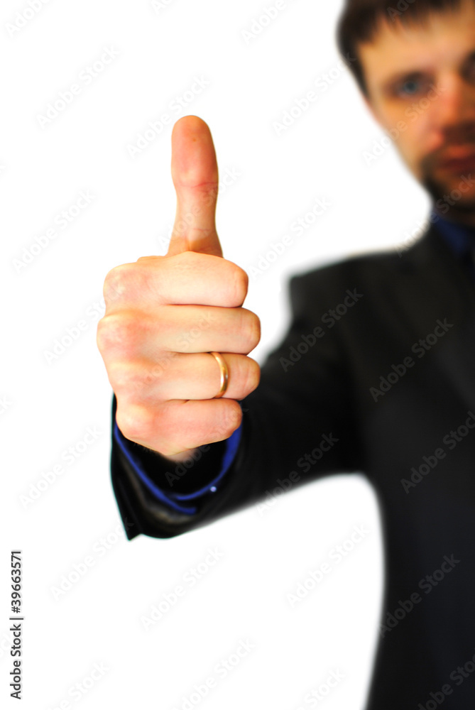 young bussinesman showing thumbs up / it's great success young bussinesman showing thumbs up / it's great success