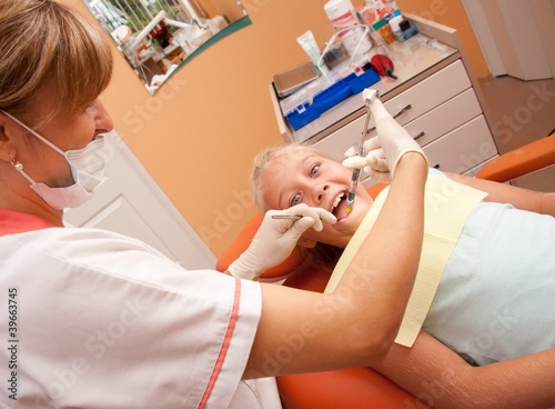 Teenage girl at the dentist.