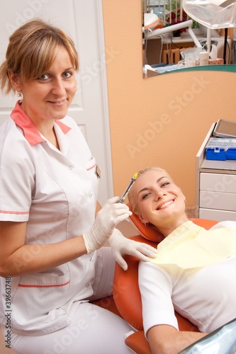 Dentist with a happy patient.