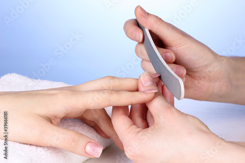 Manicure process in salon