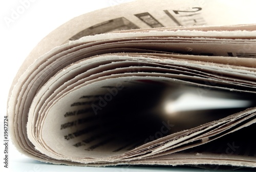 newspaper on the table, side view, close-up