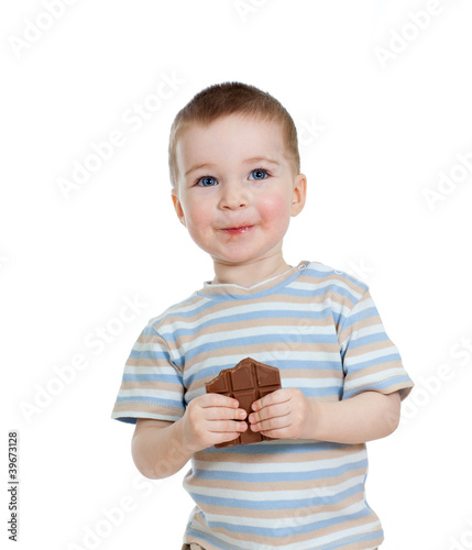 child boy eating chocolate ...