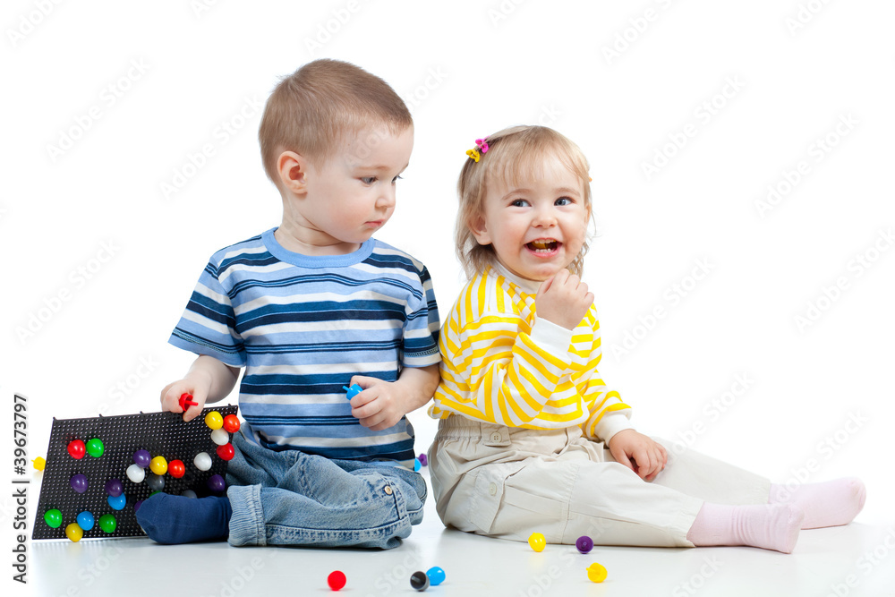 Children playing with mosaic toy Children playing with mosaic toy