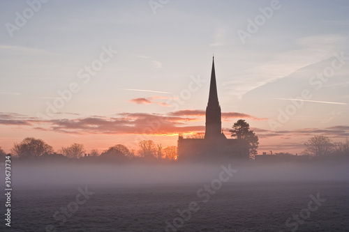 Salisbury cathedral on a misty morning