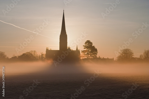 Salisbury cathedral on a misty morning © julianelliott