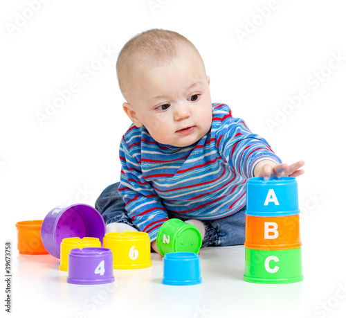 baby is playing with educat...