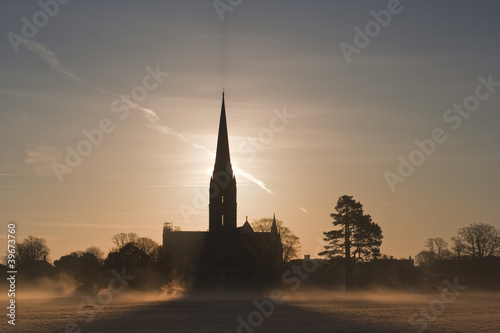 Salisbury cathedral on a misty morning