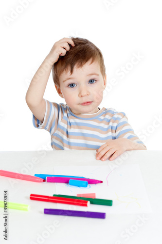 little puzzled child with c...