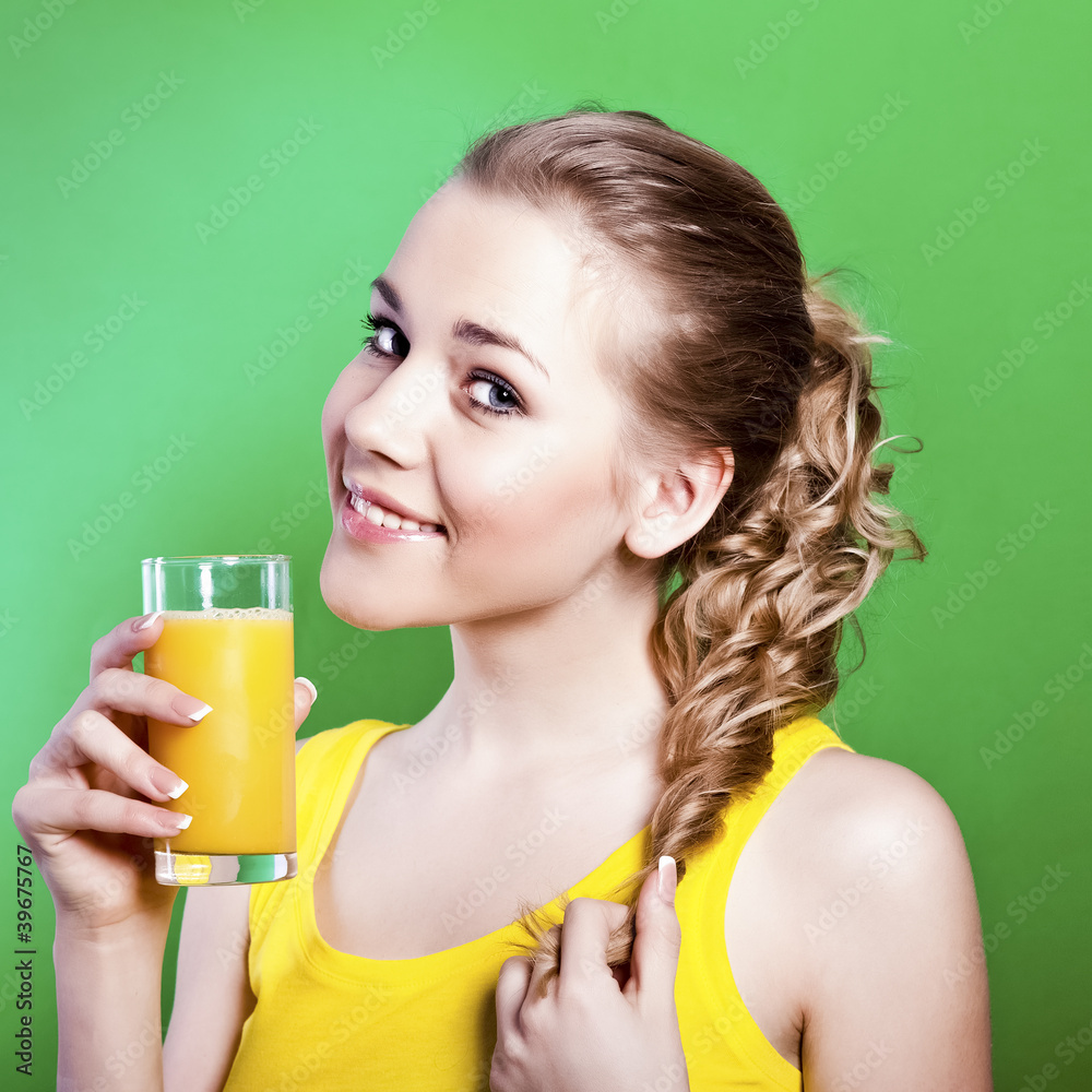 Beautiful girl drinks natural orange juice Beautiful girl drinks natural orange juice