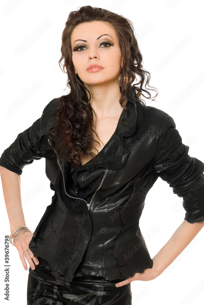 Portrait of perfect young brunette in black clothes. Isolated Portrait of perfect young brunette in black clothes. Isolated