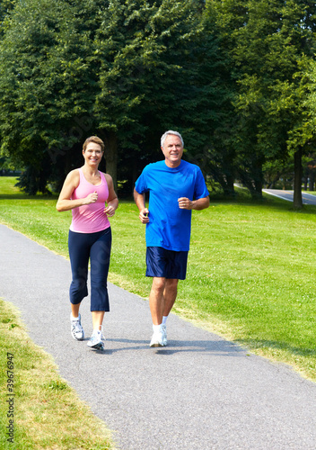 Seniors couple jogging.