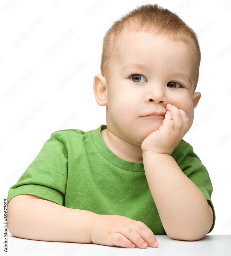 Portrait of a cute and pensive little boy Portrait of a cute and pensive little boy